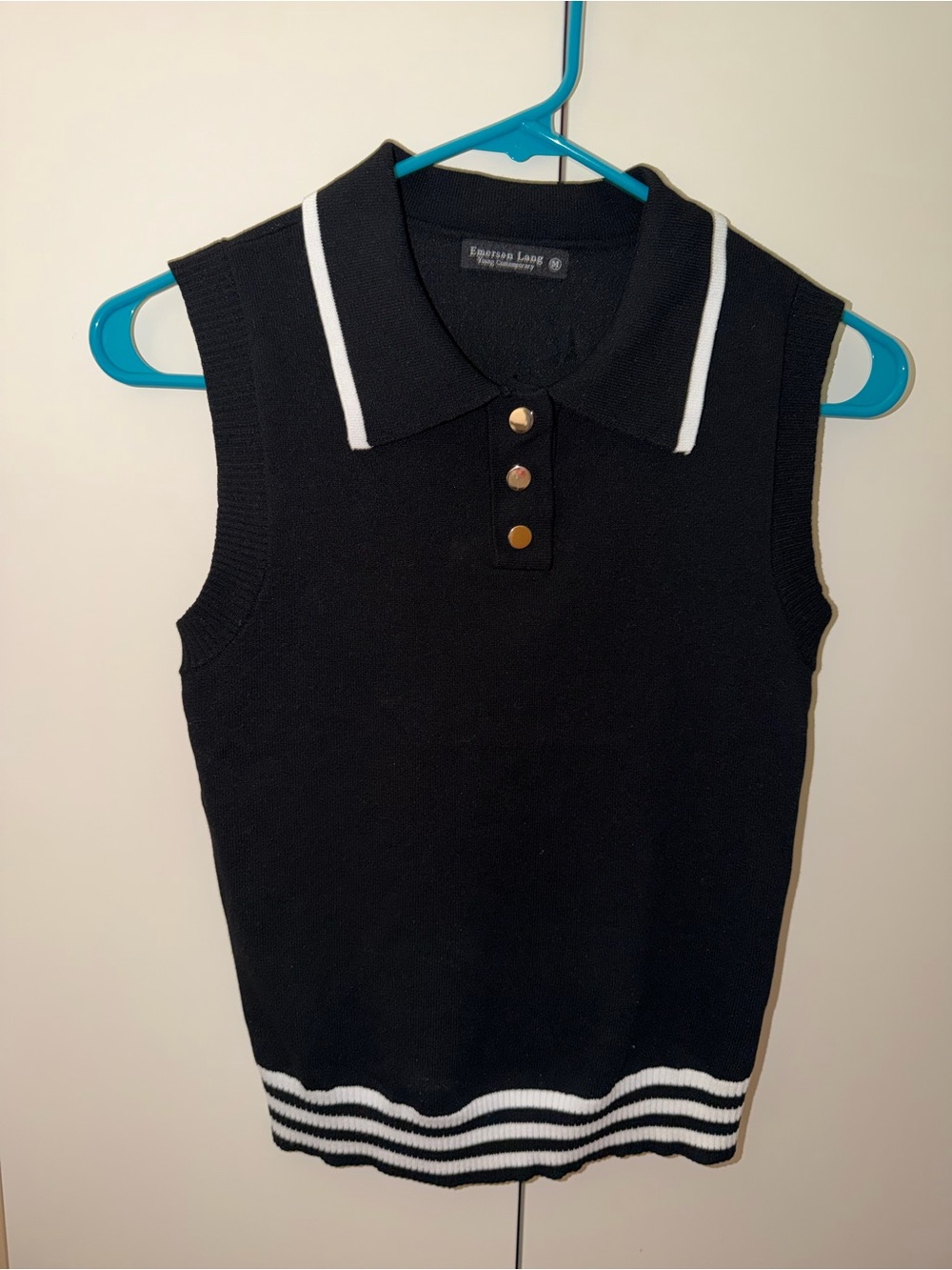 Sleeveless Black Polo Sweater with White Trim